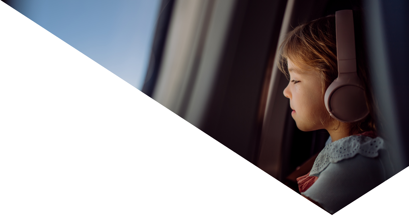 Child looking out of plane window